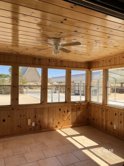 303 West Howell Avenue Ridgecrest, CA 93555 - Photo 8 of 22 a view of an empty room with a window