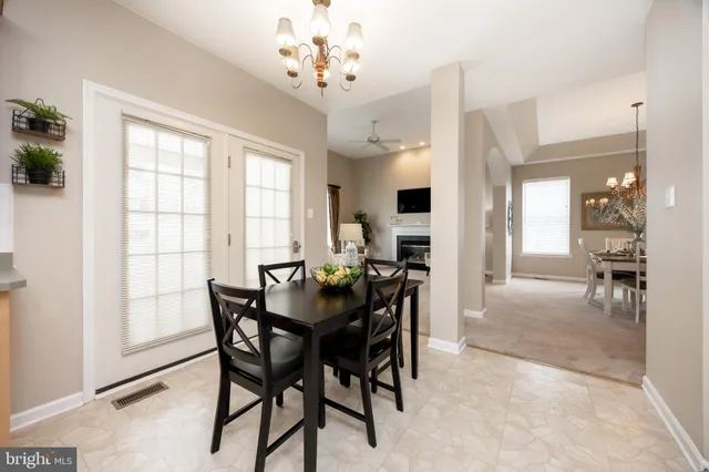 a bed room with a bed and a window