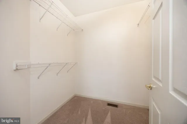 a bathroom with a sink a vanity and a mirror