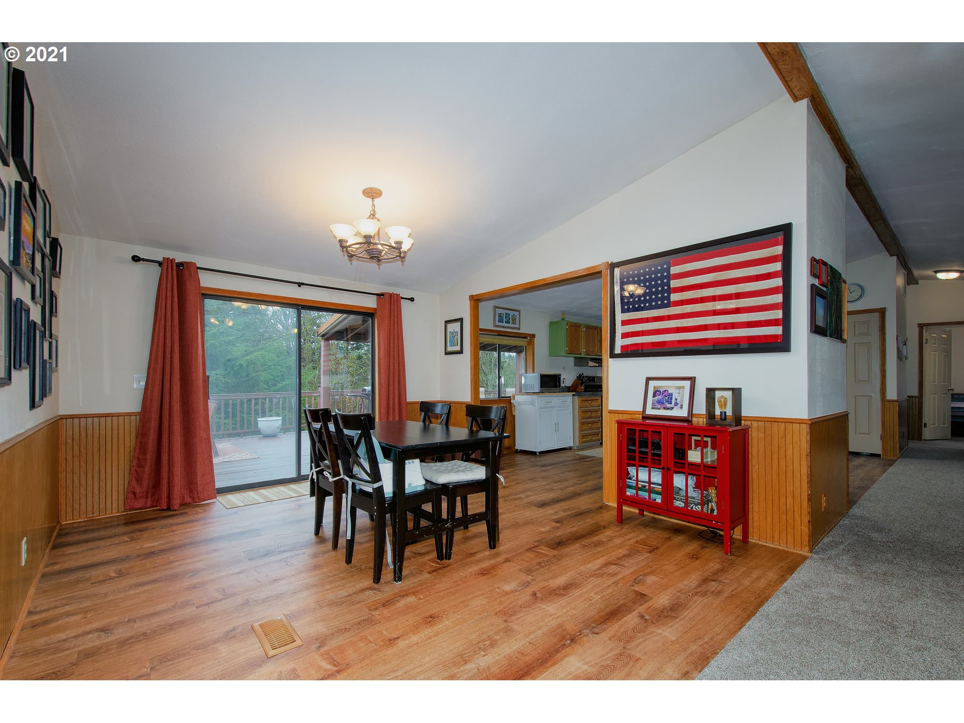 509 Northeast Pounder Road Corbett, OR 97019 - Photo 7 of 32 a dining room with furniture window and wooden floor