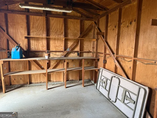 a view of an empty room with stairs