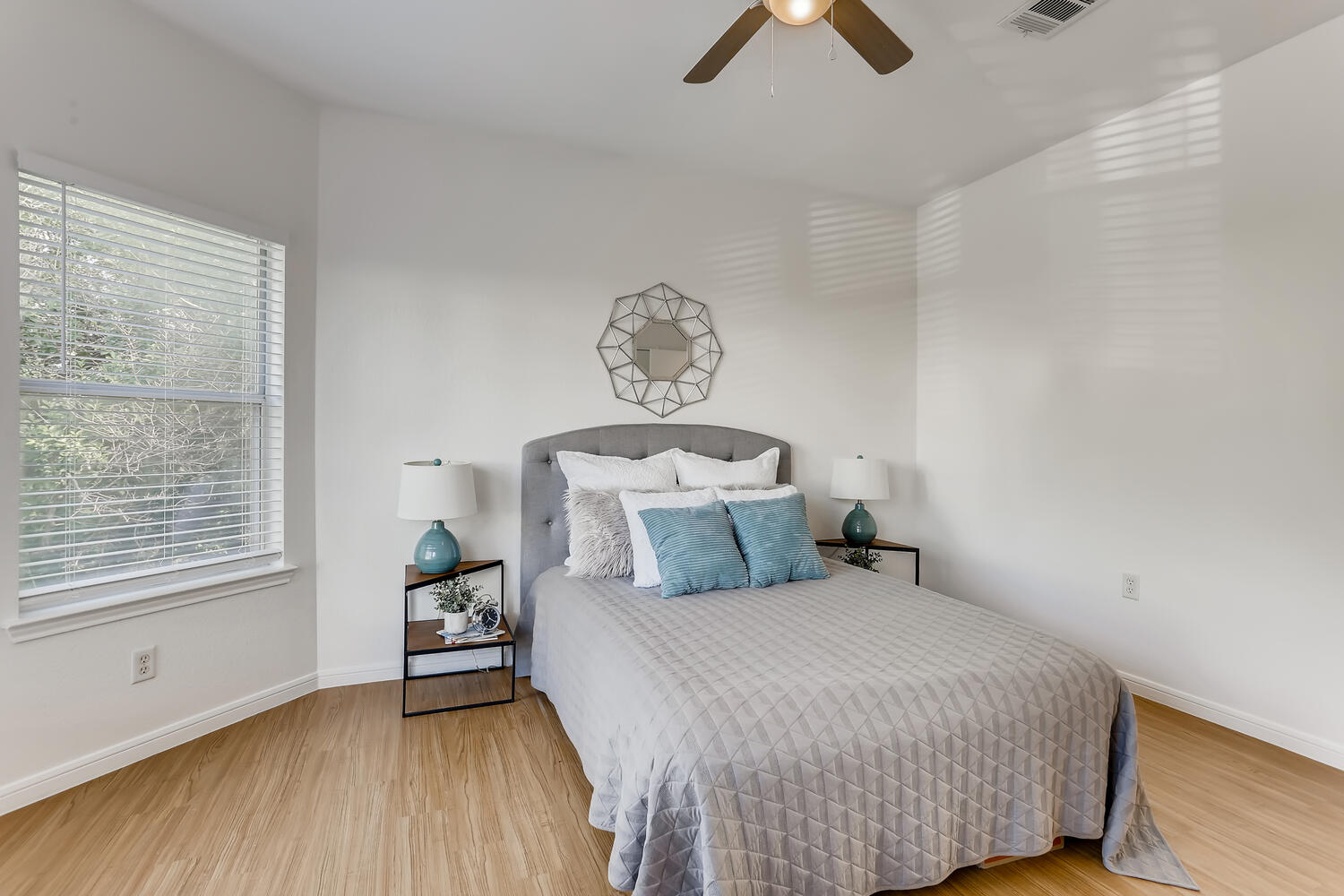 1206 Maple Avenue Austin, TX 78702 - Photo 12 of 39 a bedroom with a bed and window