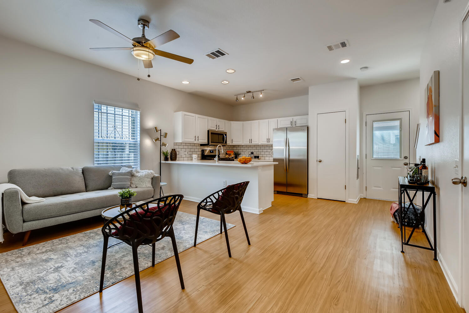 1206 Maple Avenue Austin, TX 78702 - Photo 25 of 39 a living room with furniture and a wooden floor
