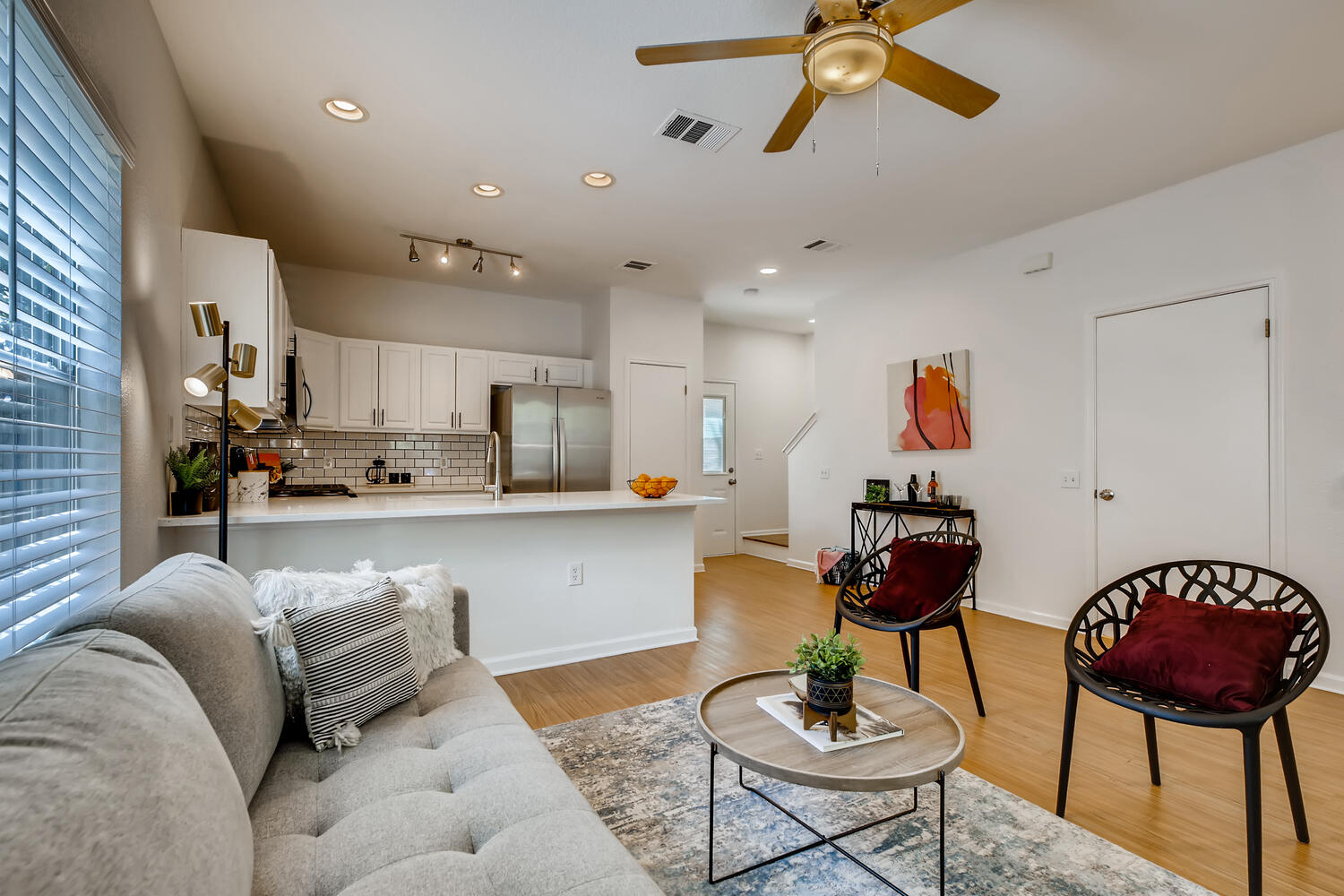 1206 Maple Avenue Austin, TX 78702 - Photo 26 of 39 a living room with furniture and kitchen view