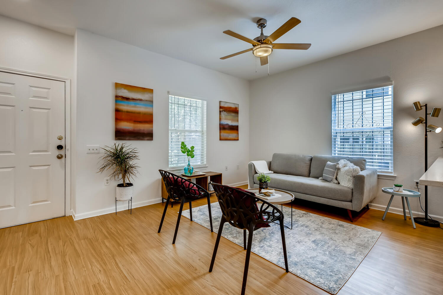 1206 Maple Avenue Austin, TX 78702 - Photo 3 of 39 a living room with furniture and a window