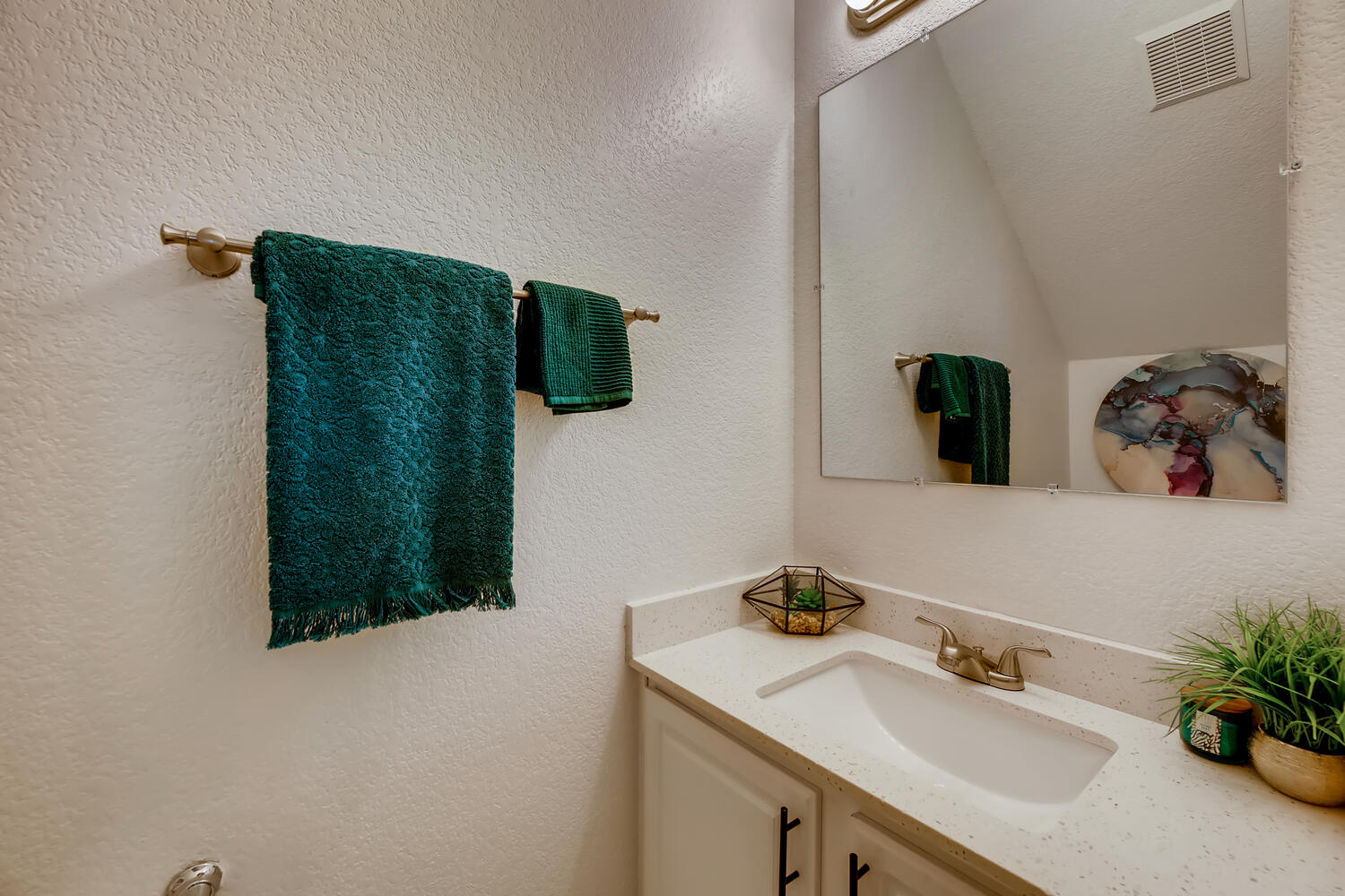 1206 Maple Avenue Austin, TX 78702 - Photo 32 of 39 a bathroom with a sink and a mirror