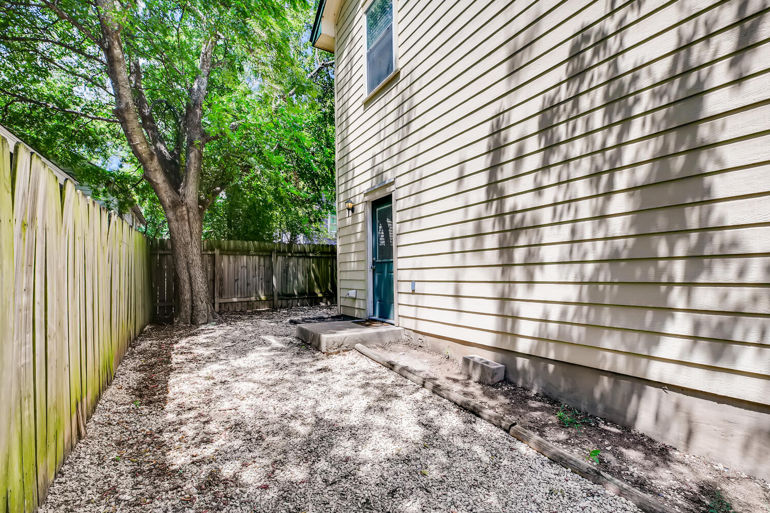 1206 Maple Avenue Austin, TX 78702 - Photo 38 of 39 a view of a backyard with a large tree