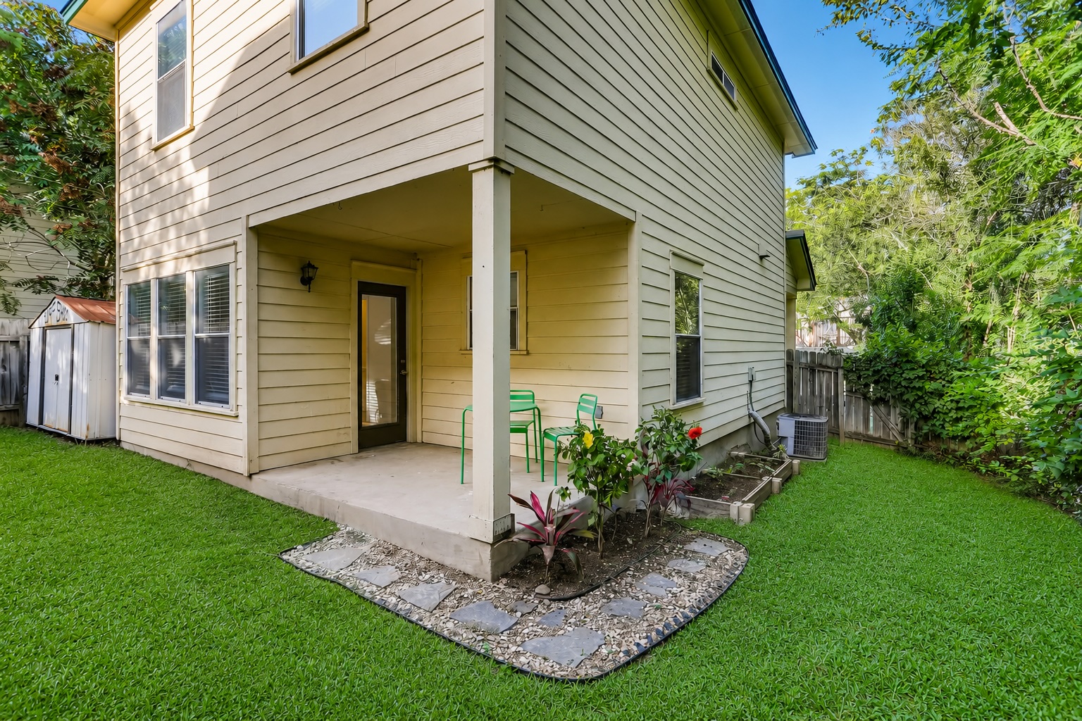 1206 Maple Avenue Austin, TX 78702 - Photo 4 of 39 Unit A-yard separate from Unit B. Grass has been virtually enhanced.