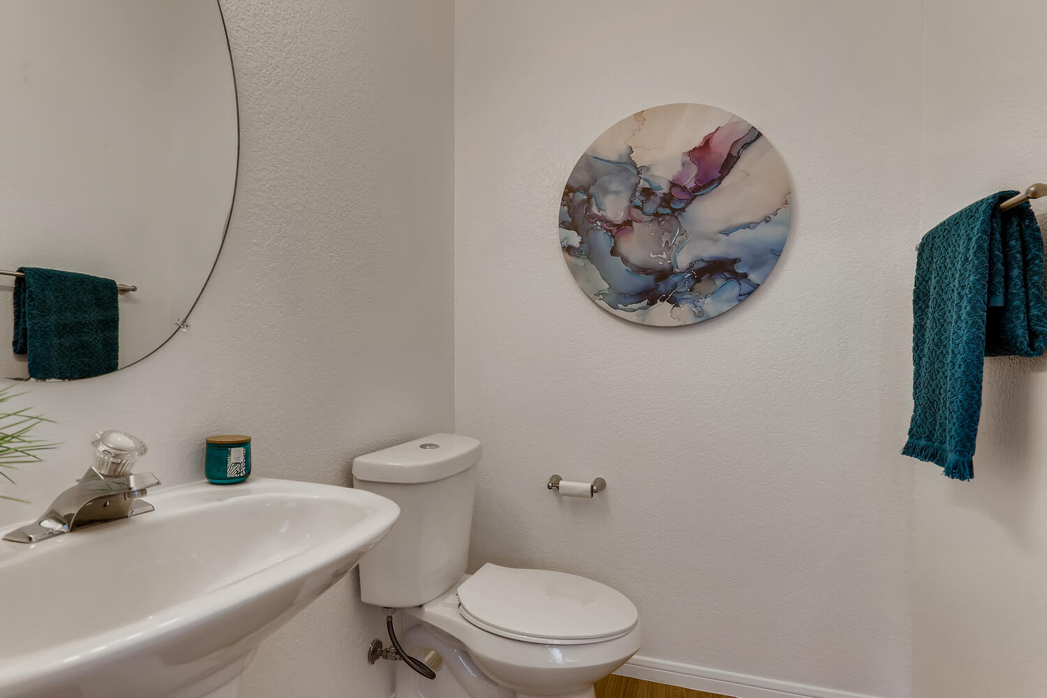 1206 Maple Avenue Austin, TX 78702 - Photo 9 of 39 a bathroom with a toilet a sink and mirror