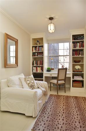 37 Beacon Street, Unit 51 Boston, MA 02108 - Photo 5 of 7 a living room with furniture and a large window