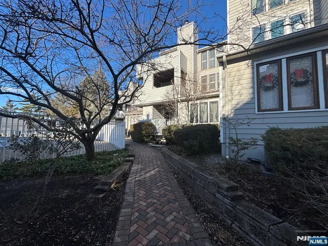 a view of a back yard of the house