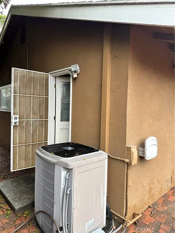 a kitchen with a refrigerator and a stove