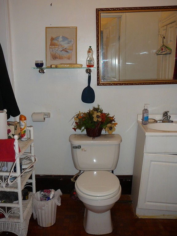 40 Revere Street Springfield, MA 01108 - Photo 12 of 21 a bathroom with a toilet sink and mirror