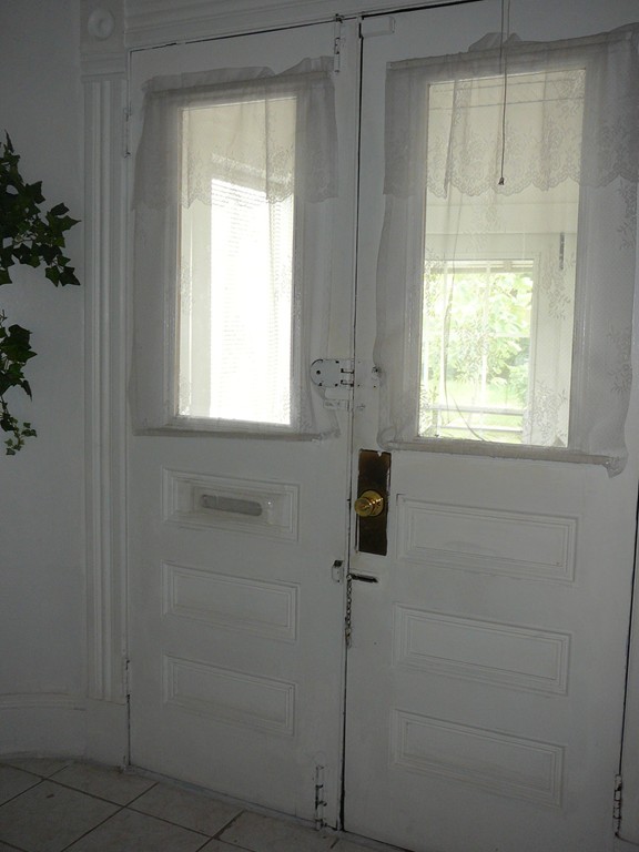 40 Revere Street Springfield, MA 01108 - Photo 13 of 21 a bathroom with a window and a shower