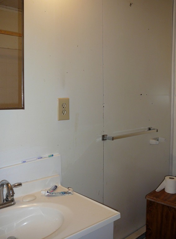 40 Revere Street Springfield, MA 01108 - Photo 18 of 21 a bathroom with a sink and a vanity