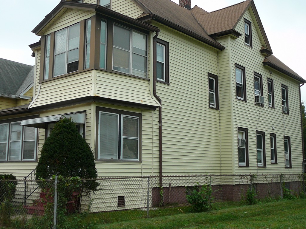 40 Revere Street Springfield, MA 01108 - Photo 21 of 21 a front view of a house with a yard