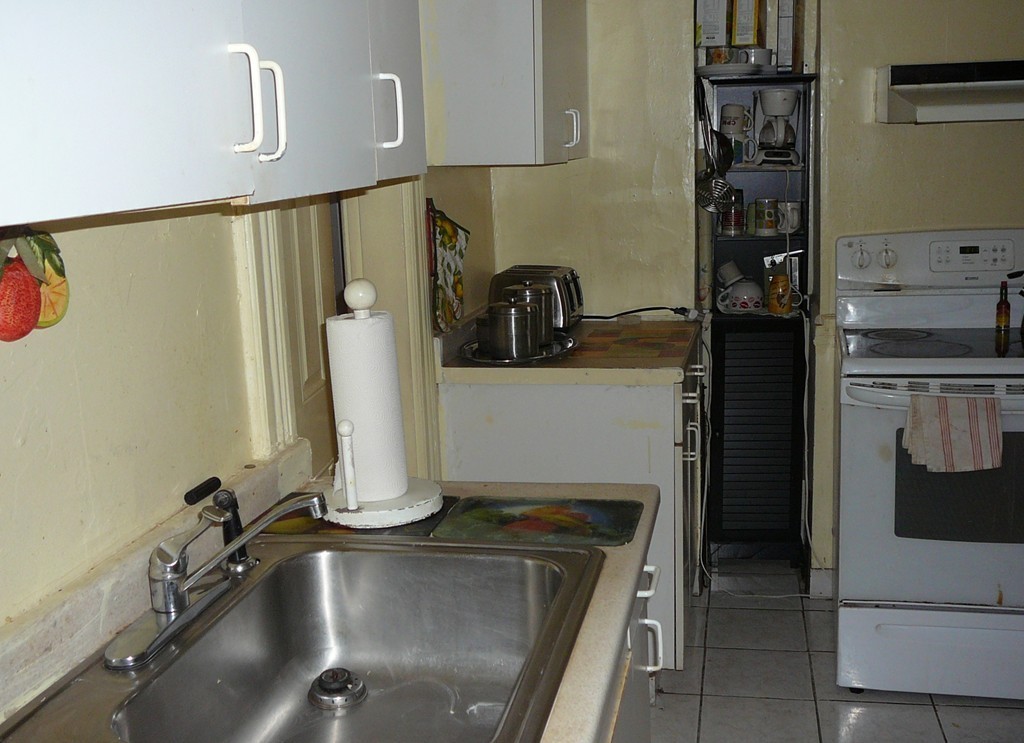 40 Revere Street Springfield, MA 01108 - Photo 4 of 21 a kitchen with a sink appliances and cabinets