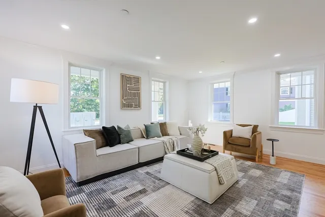 a living room with furniture and a couch
