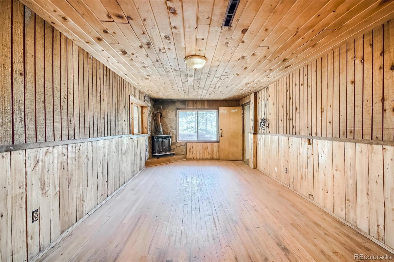 145 Bailey Drive Bailey, CO 80421 - Photo 26 of 40 a view of entryway with wooden floor