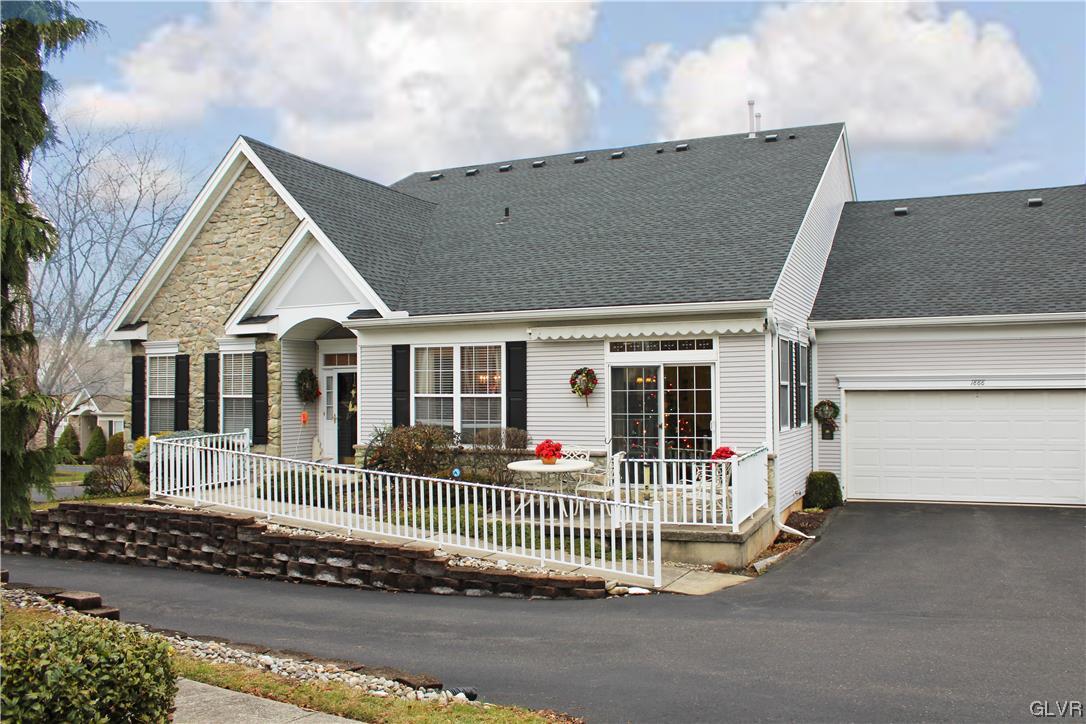 a front view of a house with a porch