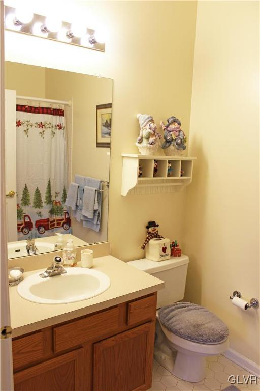 1888 Gregory Place Hellertown, PA 18055 - Photo 14 of 33 a bathroom with a sink mirror and toilet