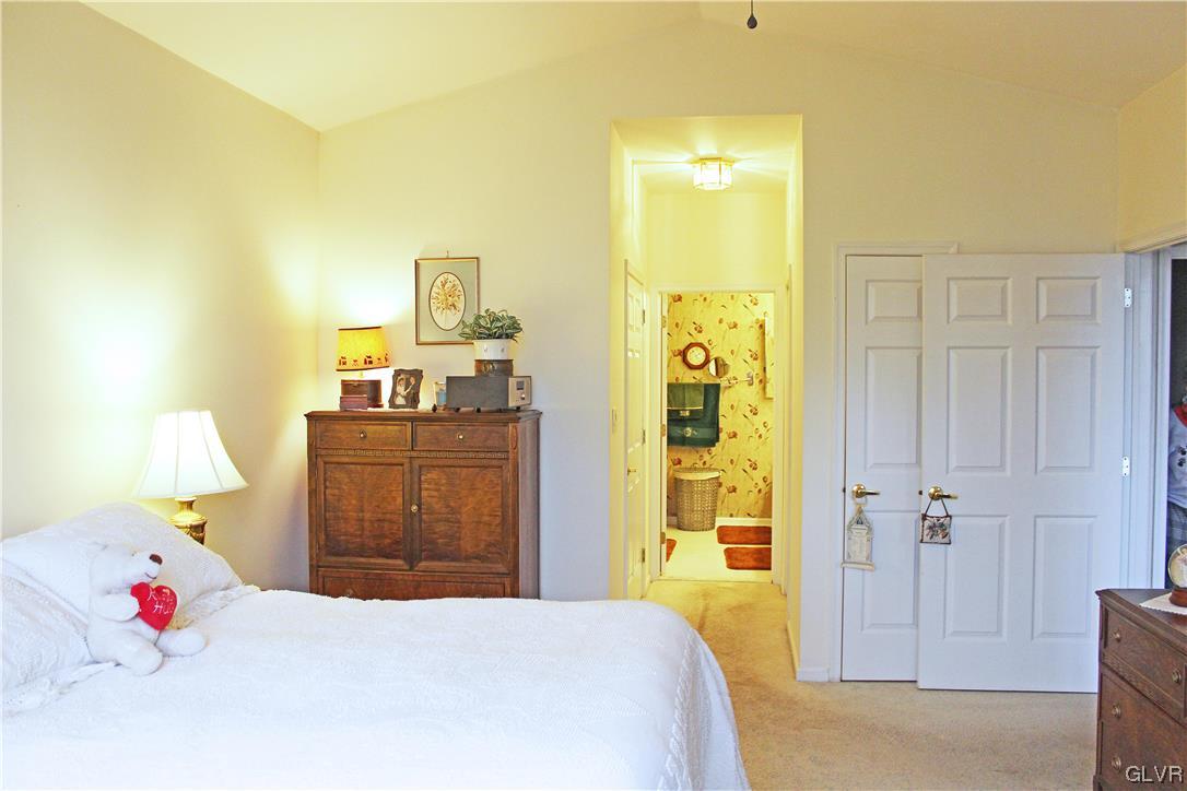 1888 Gregory Place Hellertown, PA 18055 - Photo 16 of 33 a bedroom with a bed and a chandelier