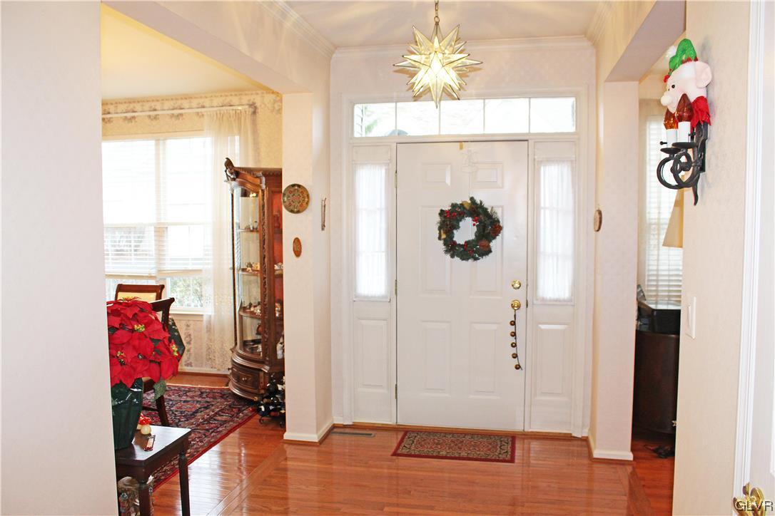 1888 Gregory Place Hellertown, PA 18055 - Photo 2 of 33 an entryway to room with wooden floor and windows