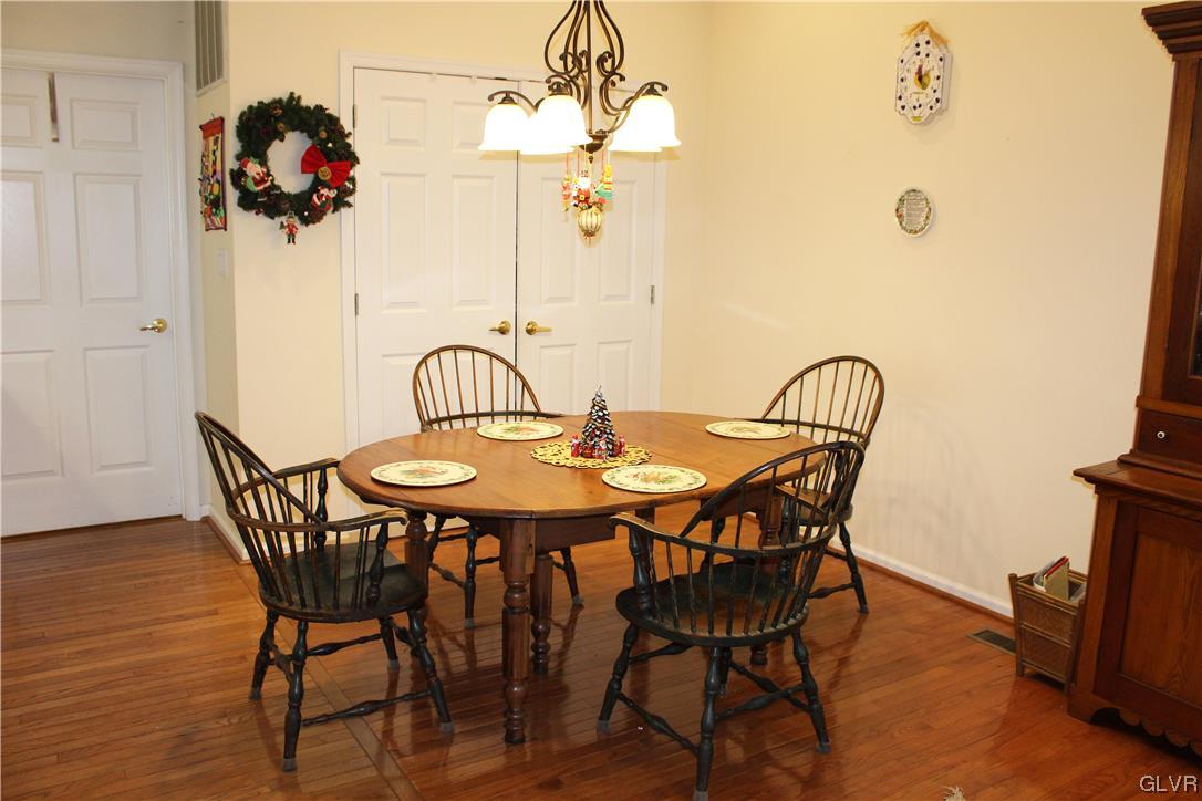 1888 Gregory Place Hellertown, PA 18055 - Photo 10 of 33 a view of a dining room with furniture and wooden floor