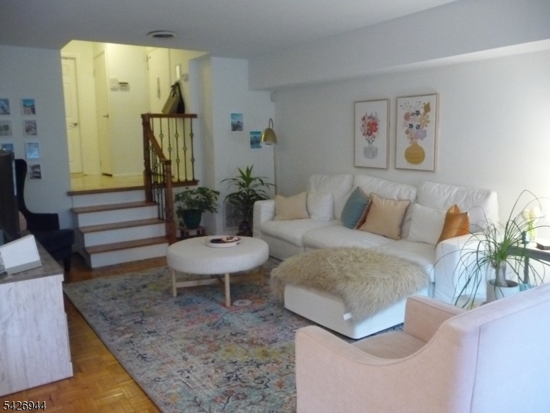 29 Up Mountain Avenue, Unit 2 Montclair, NJ 07042 - Photo 5 of 15 a living room with furniture and a rug