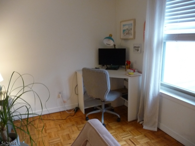 29 Up Mountain Avenue, Unit 2 Montclair, NJ 07042 - Photo 7 of 15 a view of a workspace with furniture and a window