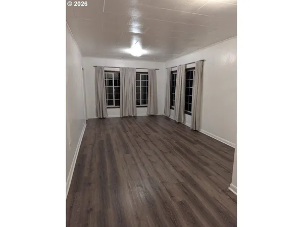 a view of a house with wooden floor