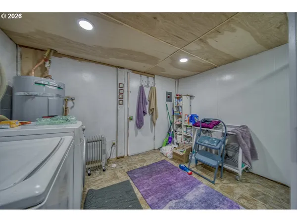 a room with furniture and a wooden floor