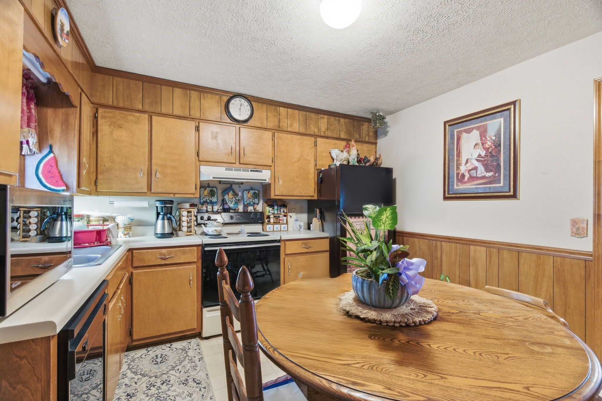 115 Gayla Court Portland, TN 37148 - Photo 11 of 46 a kitchen with a stove a sink and cabinets