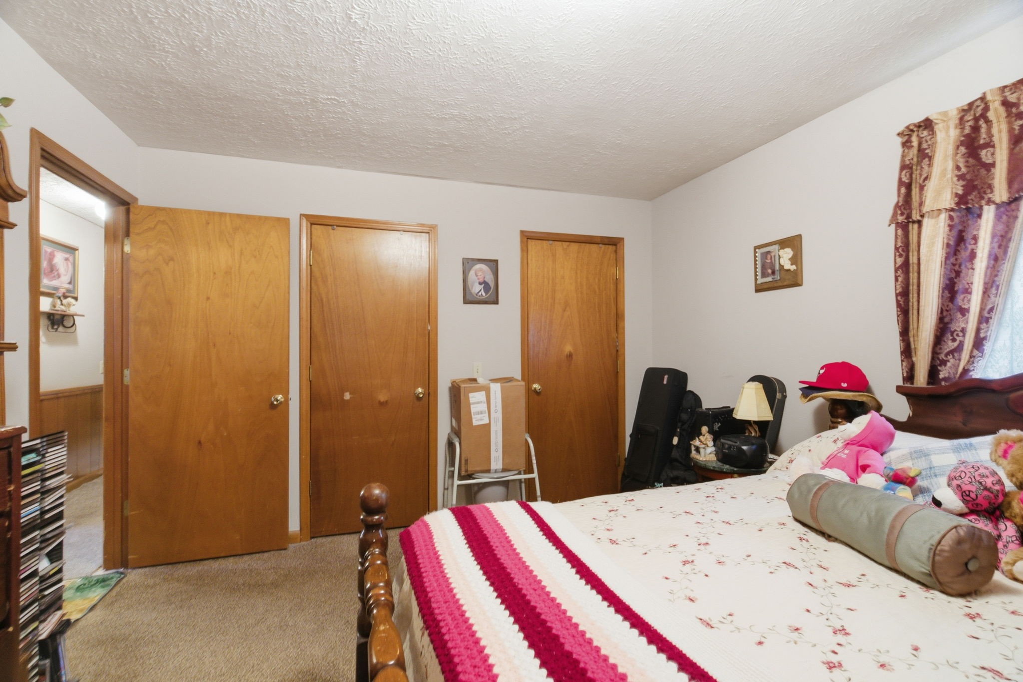 115 Gayla Court Portland, TN 37148 - Photo 20 of 46 a bedroom with a bed and a dresser