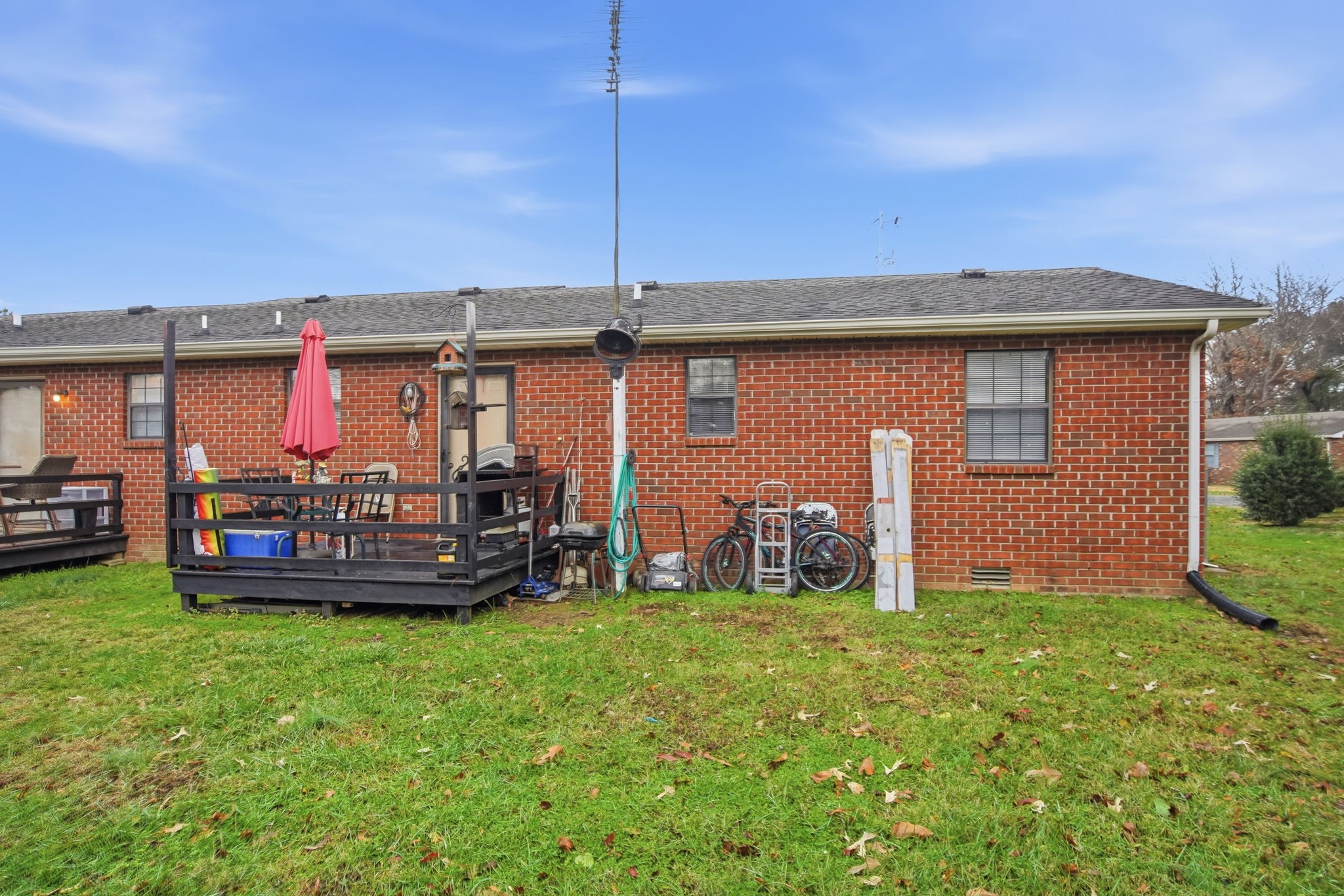 115 Gayla Court Portland, TN 37148 - Photo 25 of 46 a view of a chair and table in backyard of the house