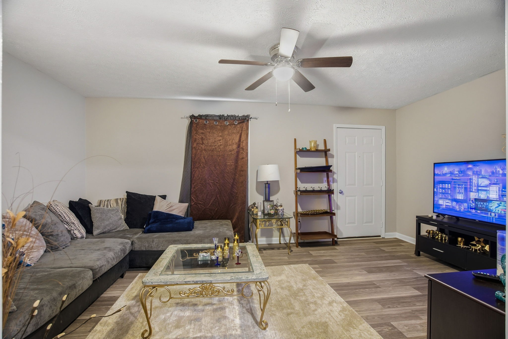 115 Gayla Court Portland, TN 37148 - Photo 31 of 46 a living room with furniture and wooden floor