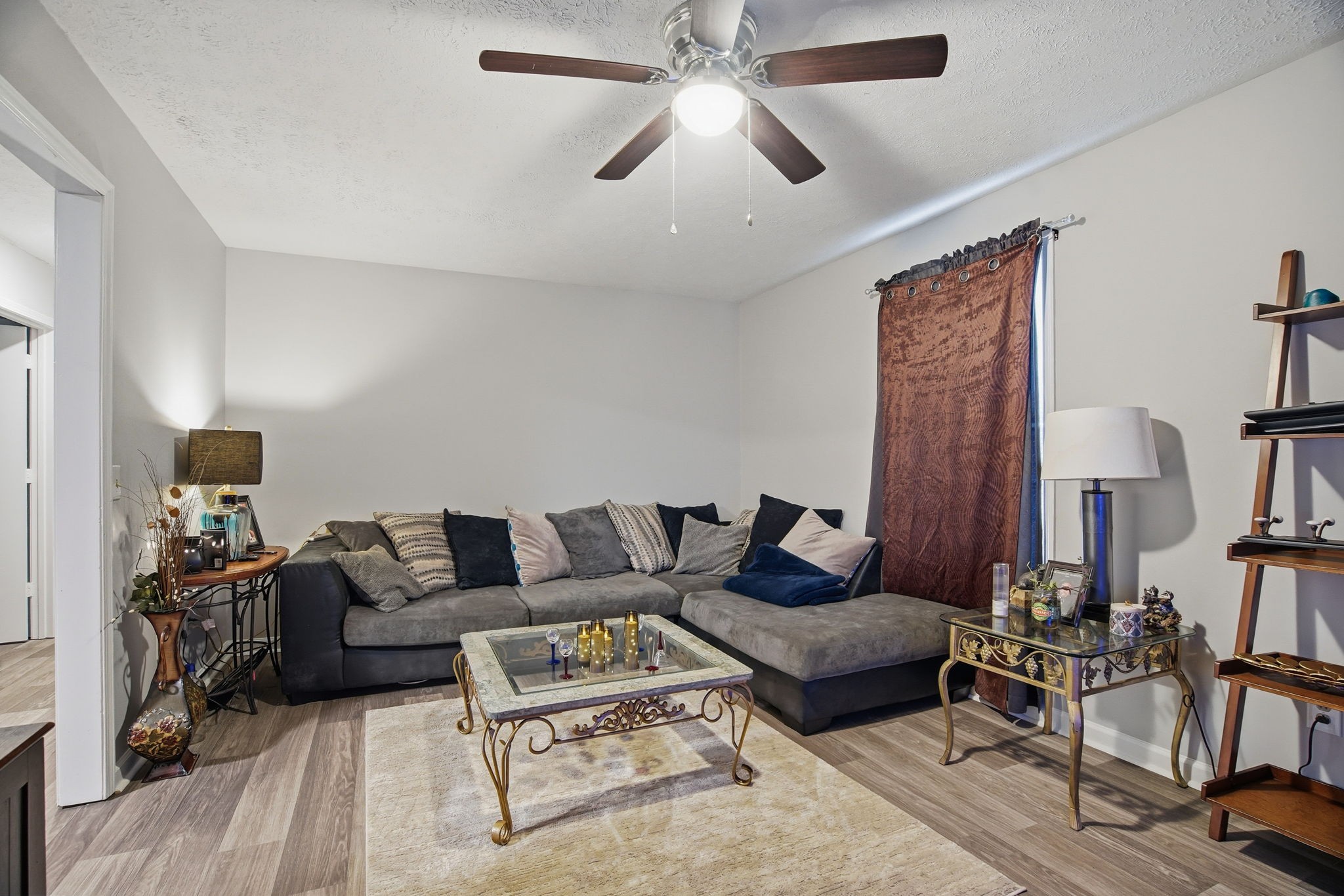 115 Gayla Court Portland, TN 37148 - Photo 32 of 46 a living room with furniture and a flat screen tv