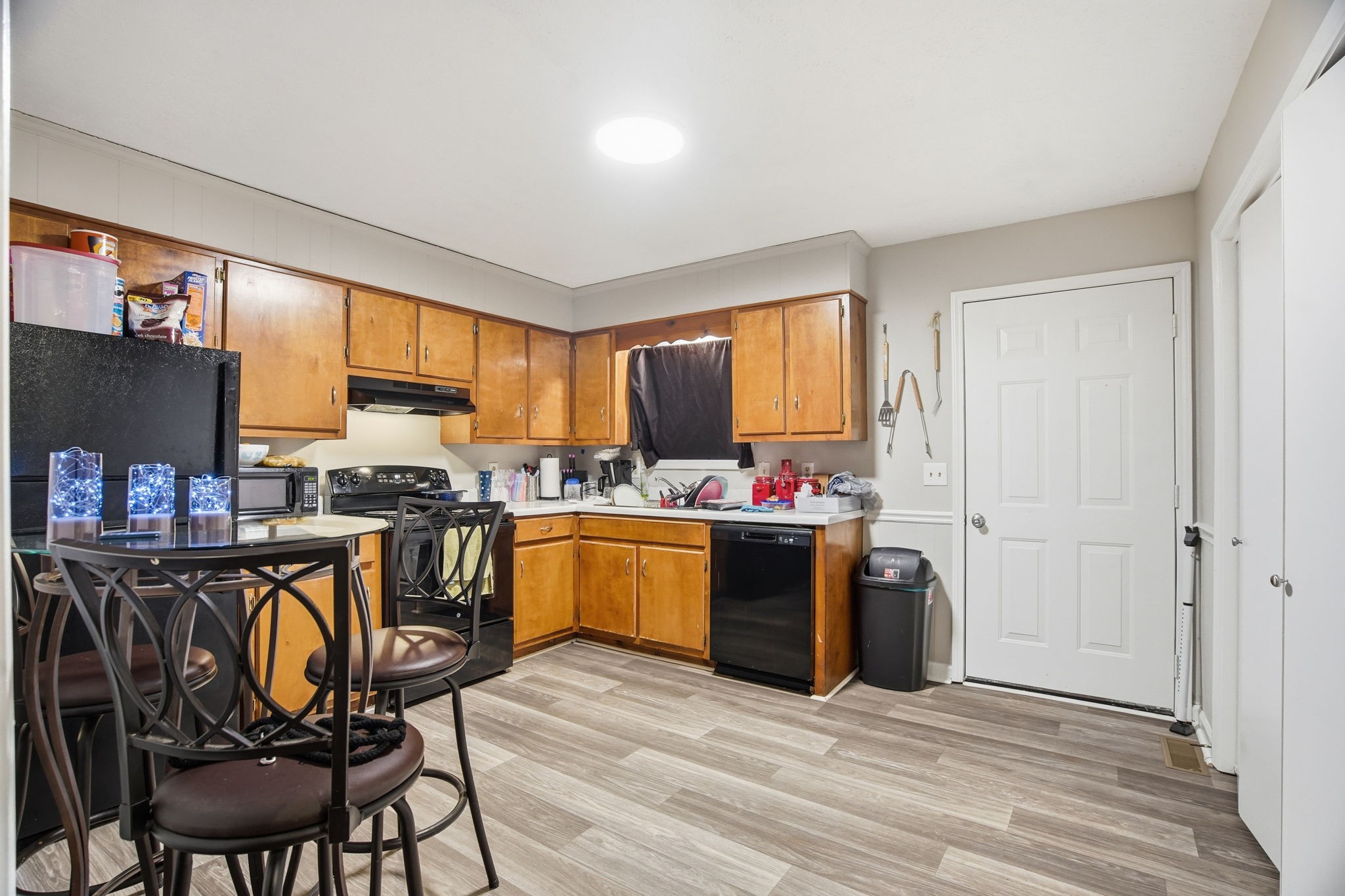 115 Gayla Court Portland, TN 37148 - Photo 34 of 46 a view of kitchen with granite countertop cabinets and wooden floor