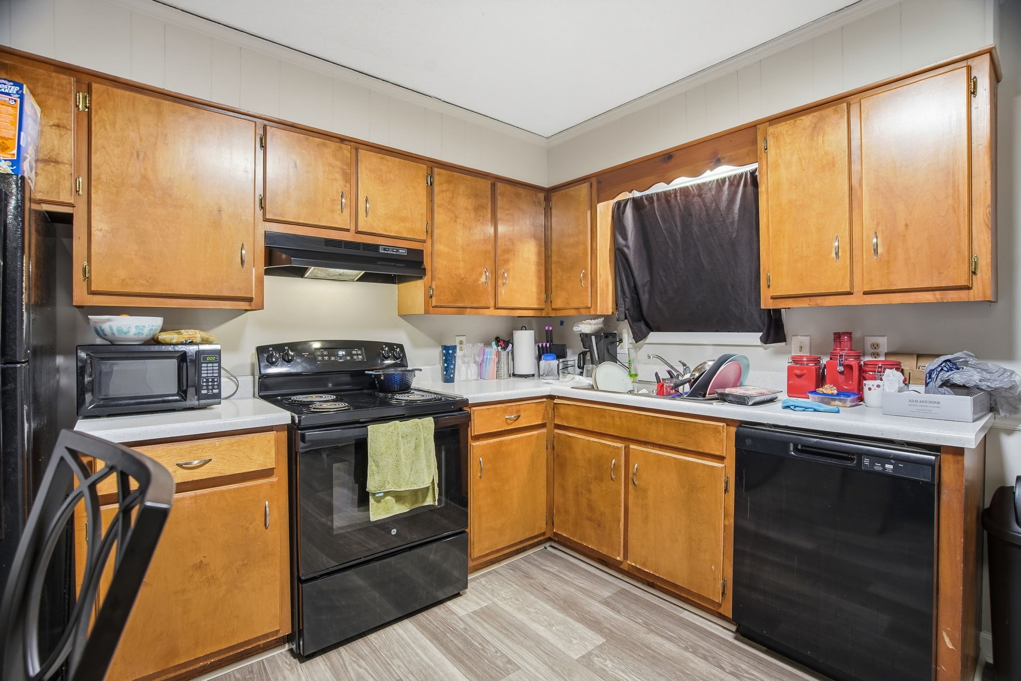 115 Gayla Court Portland, TN 37148 - Photo 36 of 46 a kitchen with stainless steel appliances granite countertop a sink stove and refrigerator