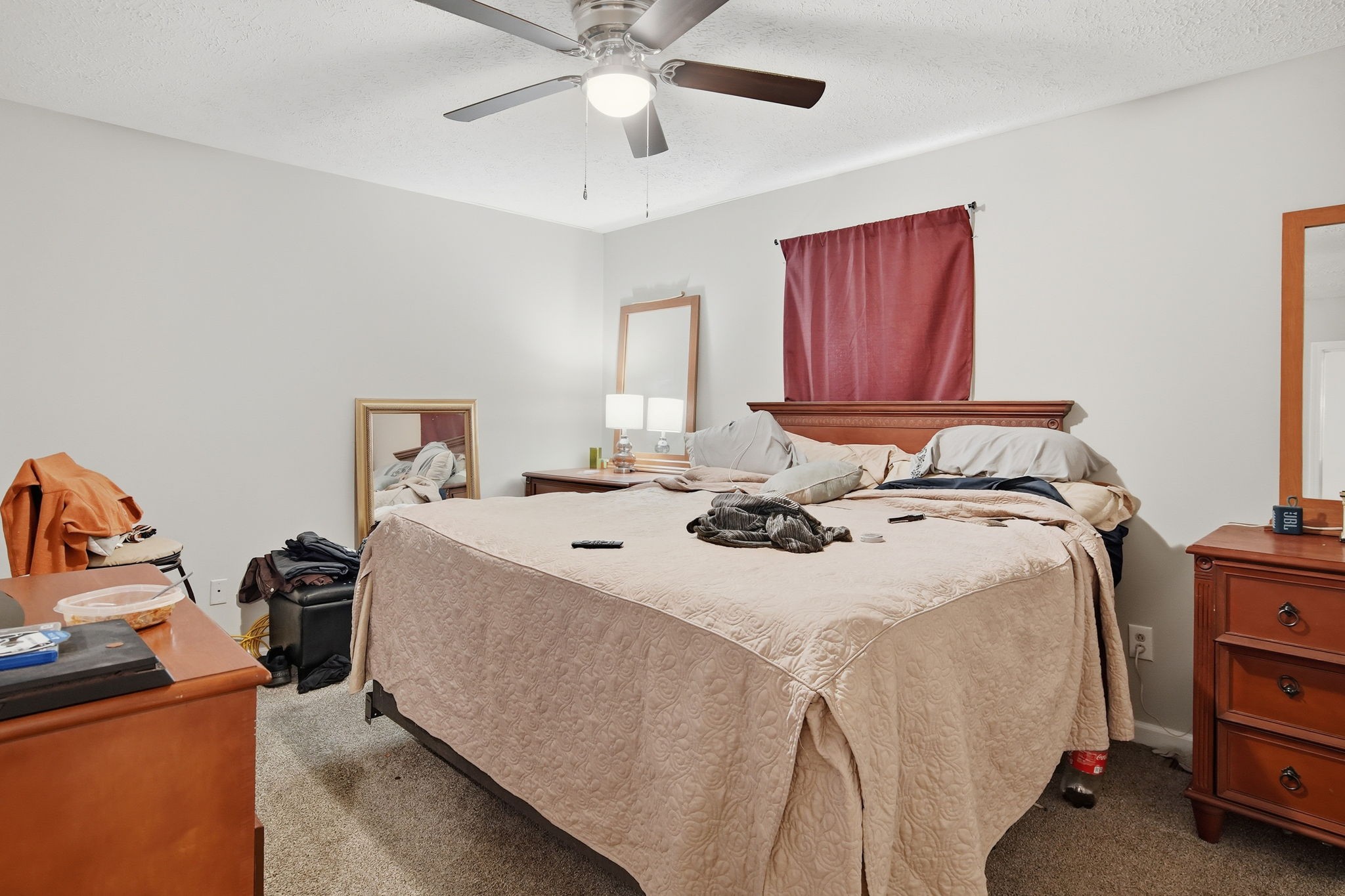 115 Gayla Court Portland, TN 37148 - Photo 40 of 46 a bedroom with a bed and a chandelier