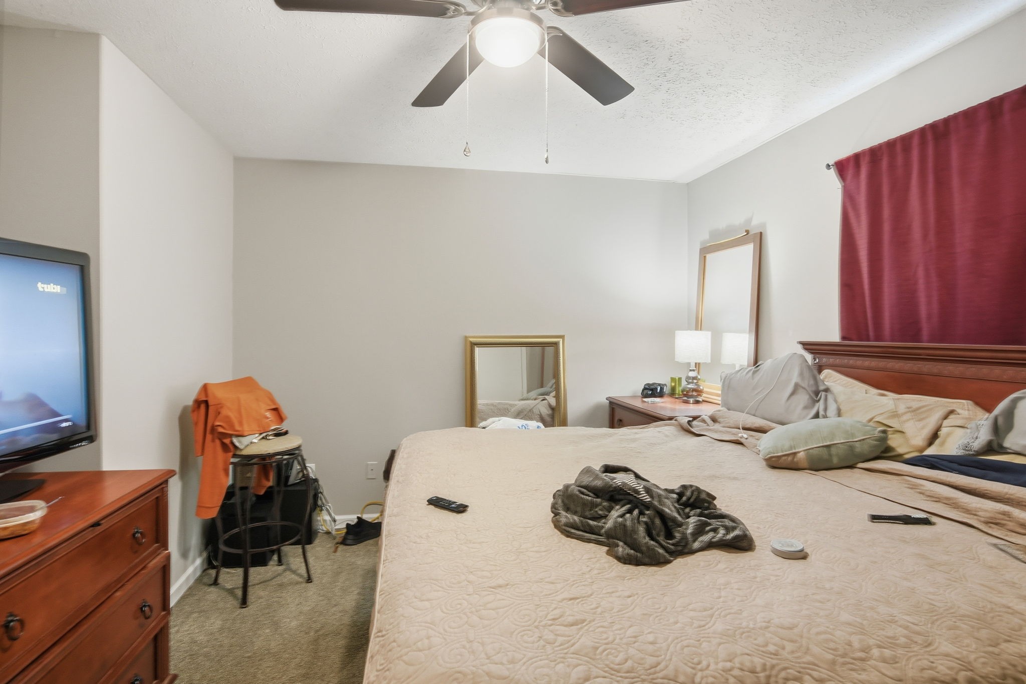 115 Gayla Court Portland, TN 37148 - Photo 41 of 46 a bedroom with a bed and a chandelier