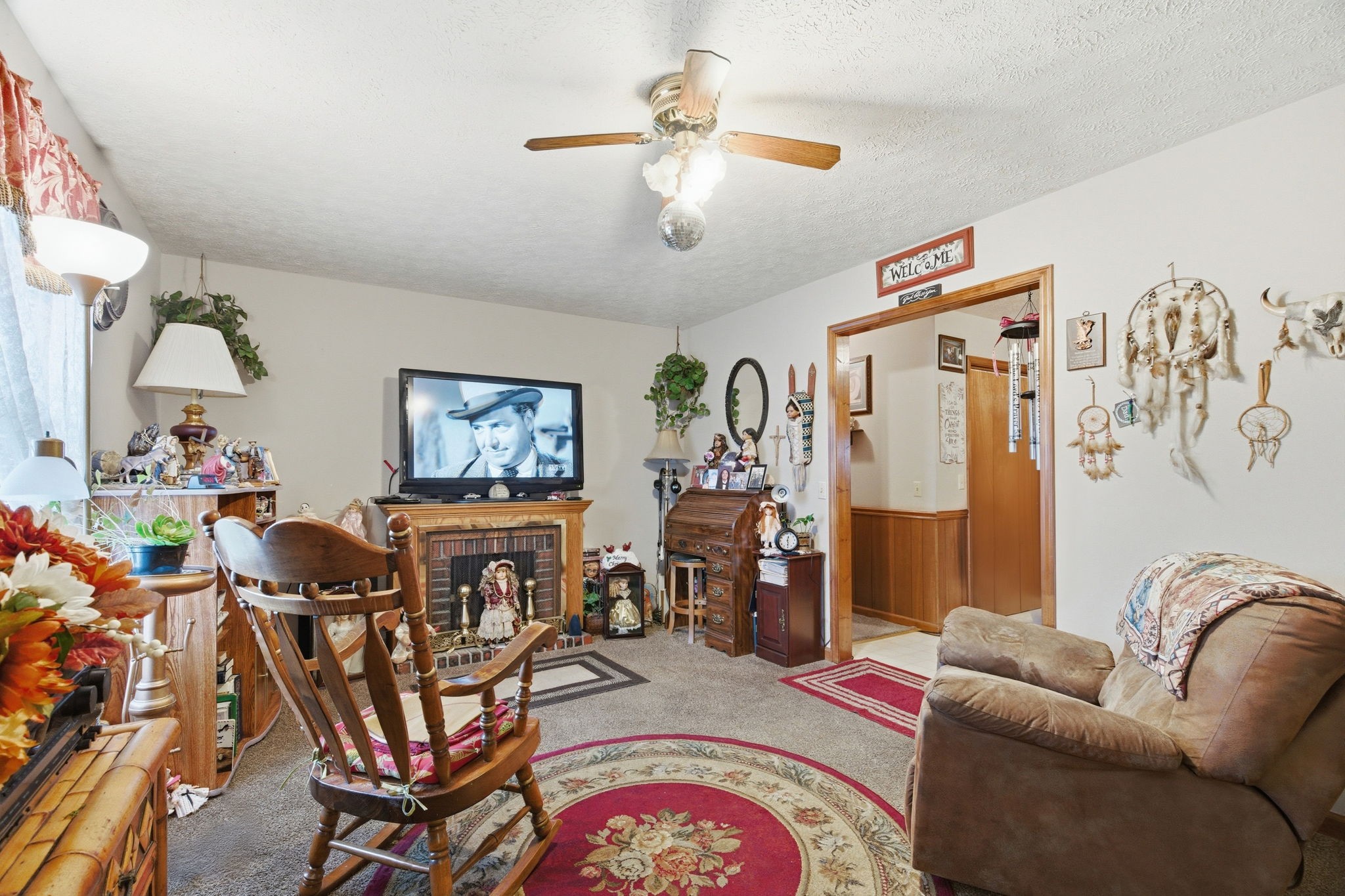 115 Gayla Court Portland, TN 37148 - Photo 6 of 46 a living room with furniture and a chandelier