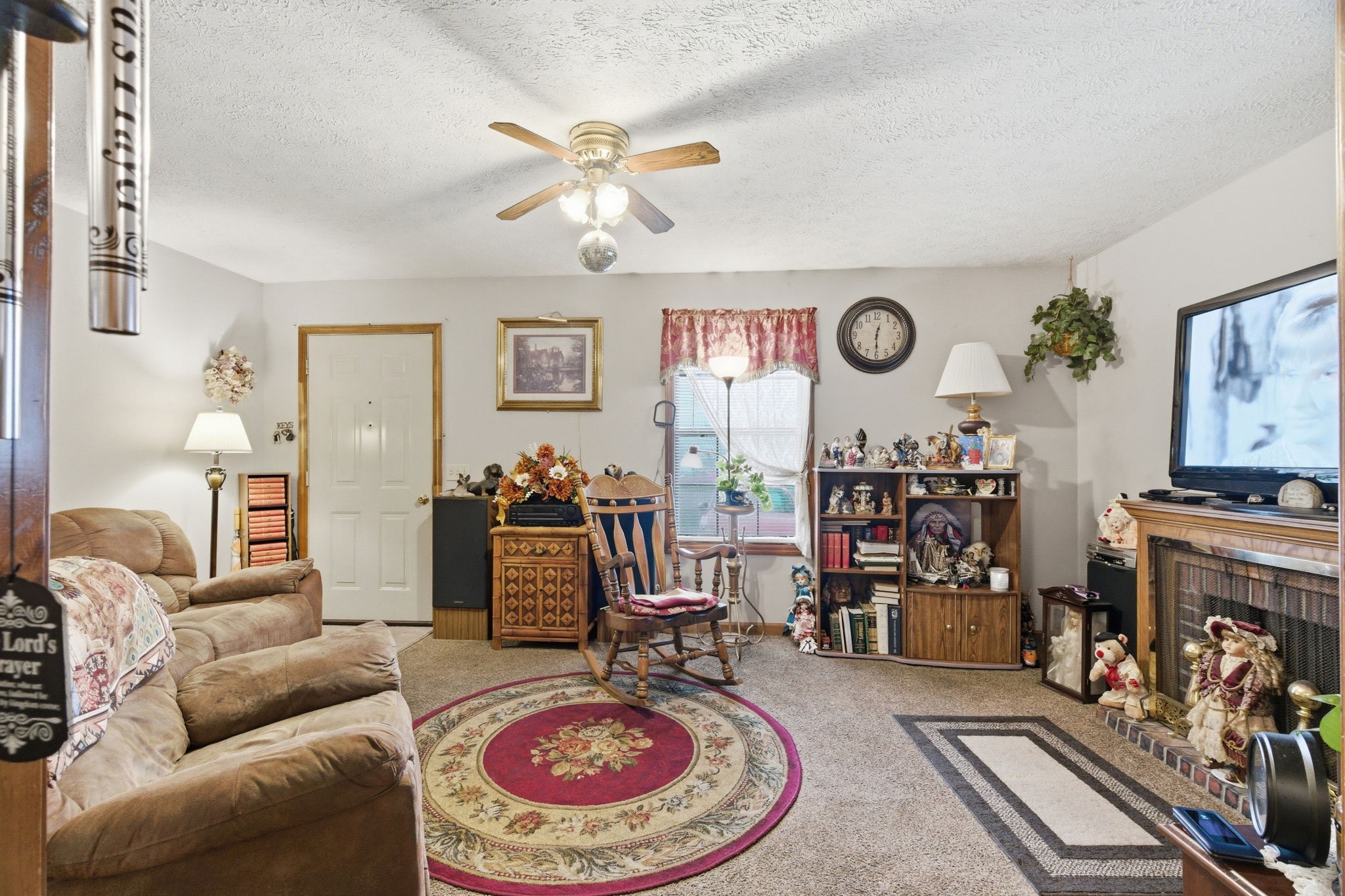 115 Gayla Court Portland, TN 37148 - Photo 7 of 46 a living room with furniture and a flat screen tv