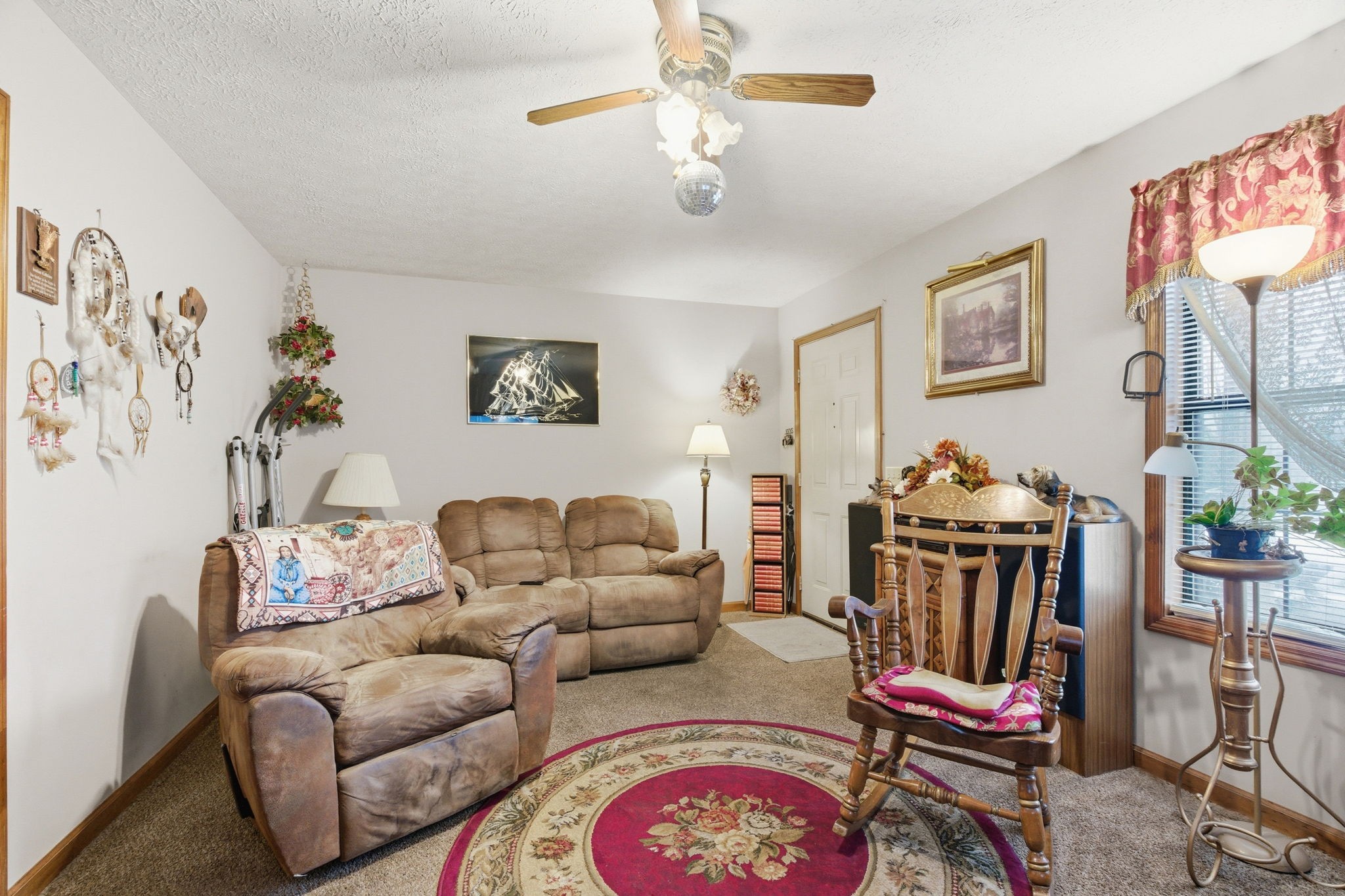 115 Gayla Court Portland, TN 37148 - Photo 8 of 46 a living room with furniture flowerpot and a chandelier