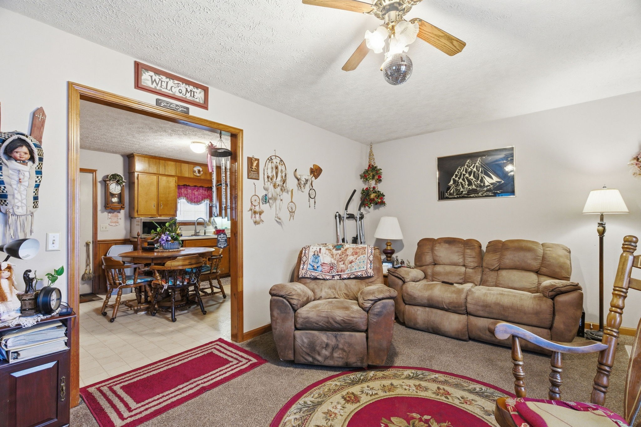 115 Gayla Court Portland, TN 37148 - Photo 9 of 46 a living room with furniture and a chandelier