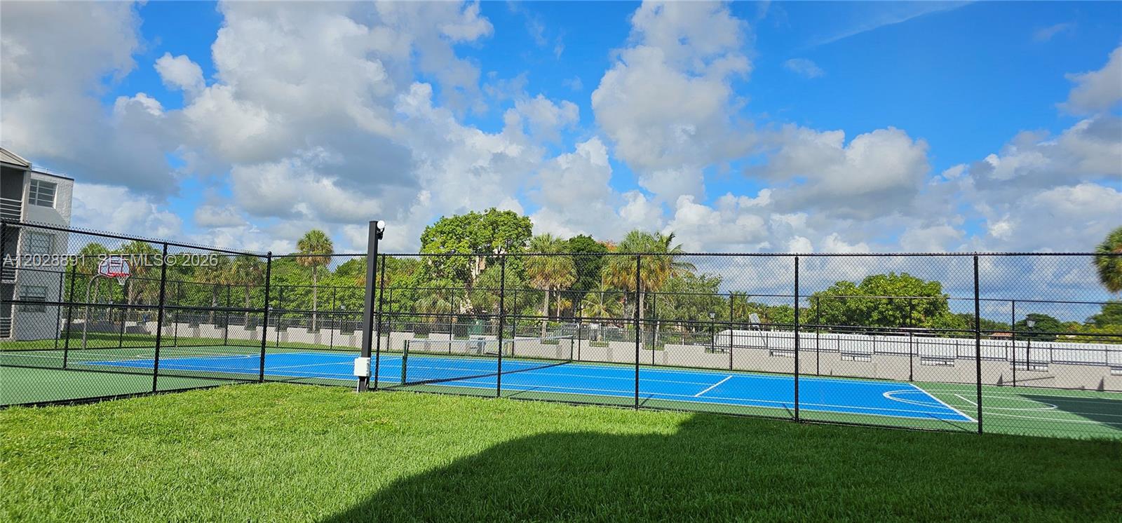 14170 Southwest 84th Street, Unit 402F Miami, FL 33183 - Photo 35 of 36 Tennis Court