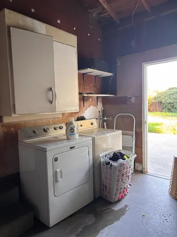 a kitchen with a stove and a sink