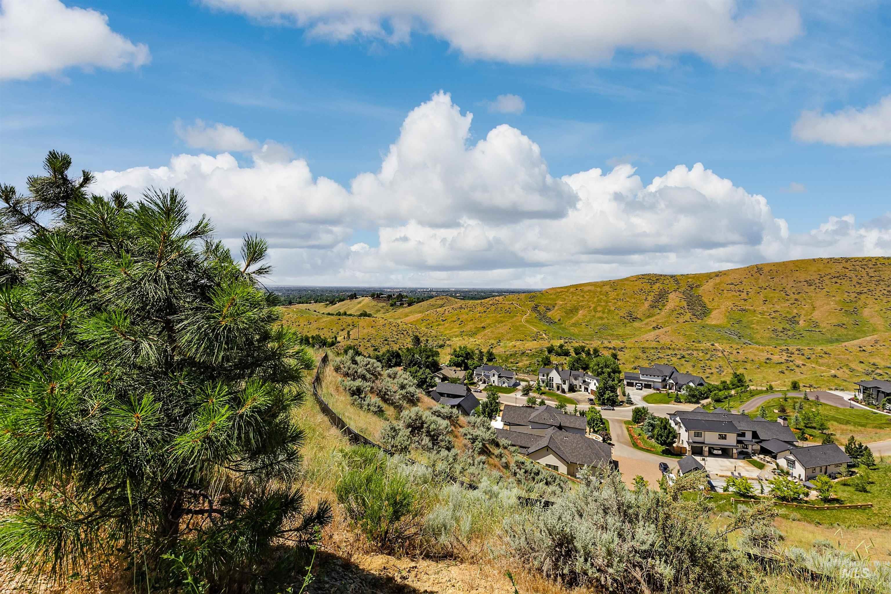 3685 North Capitol View Lane Boise, ID 83702 - Photo 22 of 36 Aerial perspective of suburban area with a mountainous background