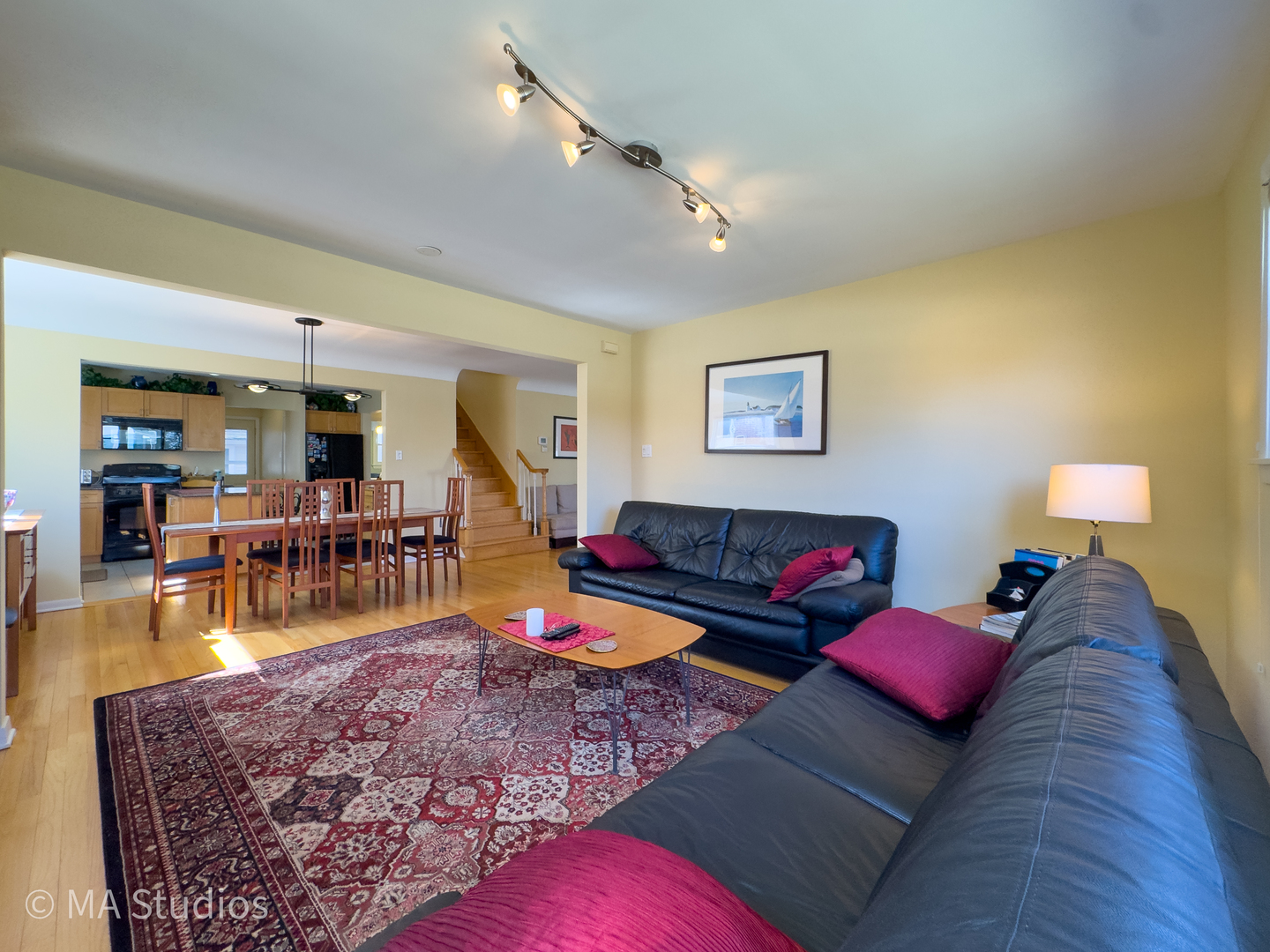 8912 Harms Road Morton Grove, IL 60053 - Photo 17 of 85 a living room with furniture and a wooden floor