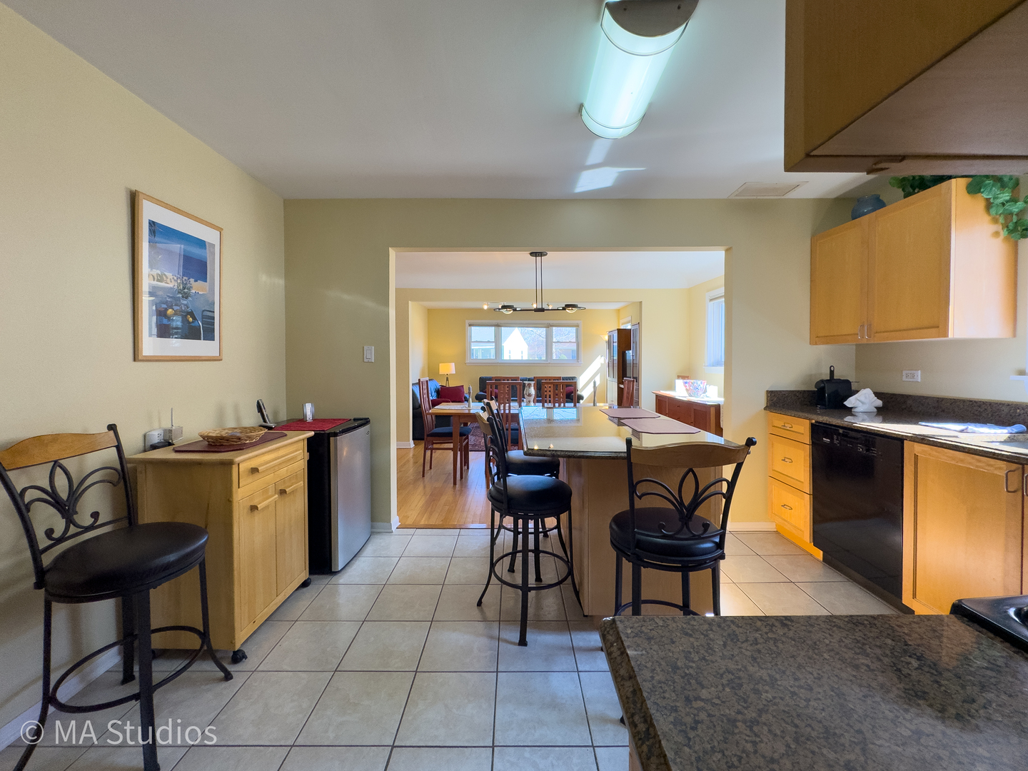 8912 Harms Road Morton Grove, IL 60053 - Photo 21 of 85 a view of a dining room with furniture and wooden floor
